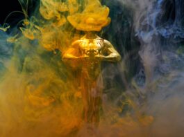 gold coloured human statue